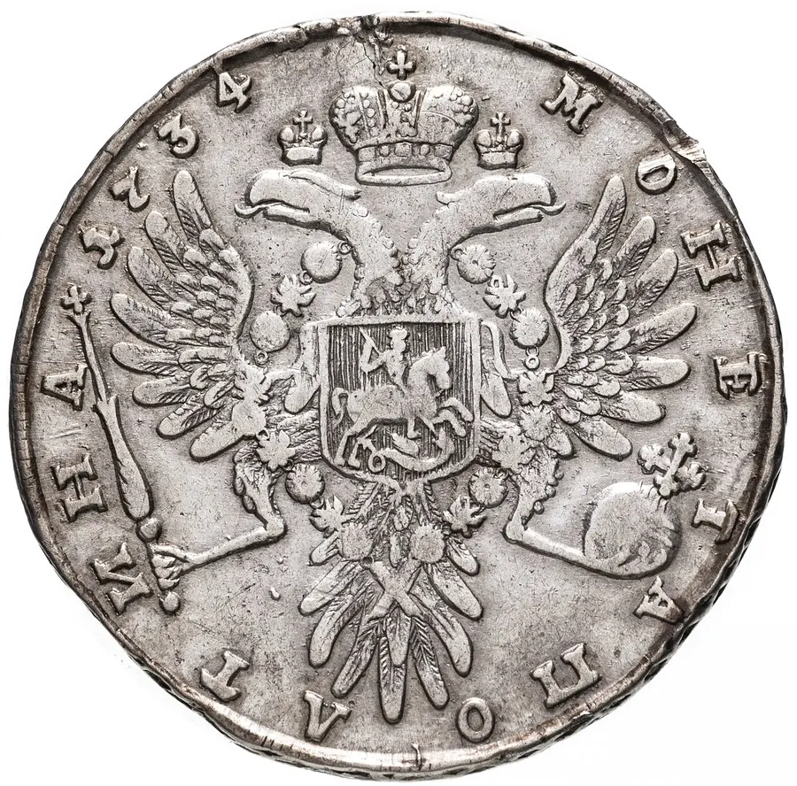 полтина 1734   тип 1735 года, с кулоном на груди, крест державы узорчатый, реверс